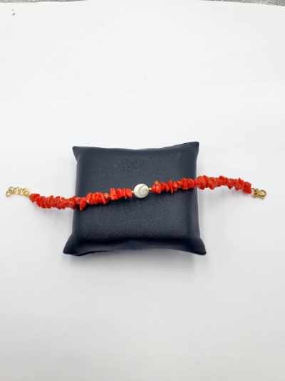 Bracelet corail et oeil rond